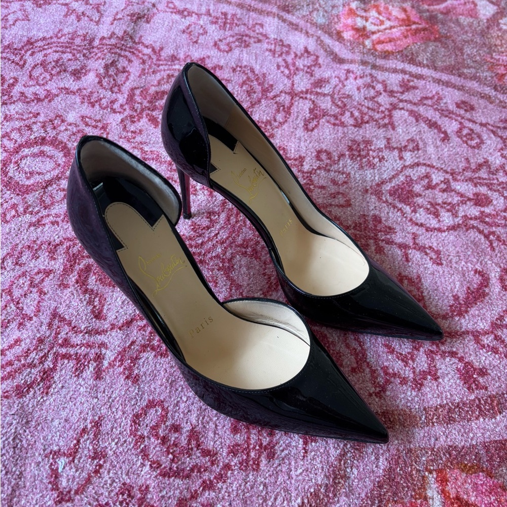 Christian Louboutins cut out inside